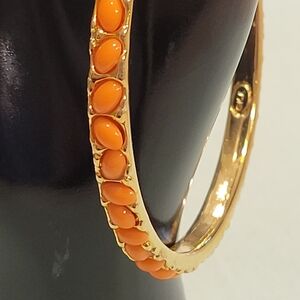 Elegant Gold and Orange Bangle Bracelet By Kenneth Jay Lane.